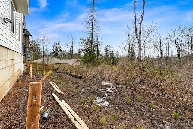 view of yard featuring fence