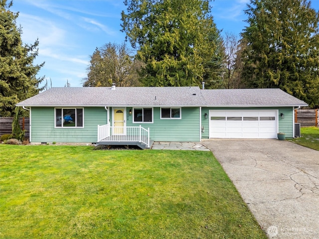 ranch-style home featuring a garage, aphalt driveway, crawl space, and a front yard