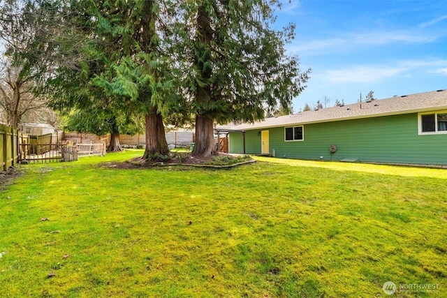 view of yard with fence