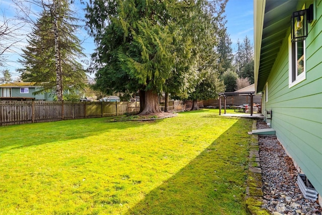 view of yard with a fenced backyard