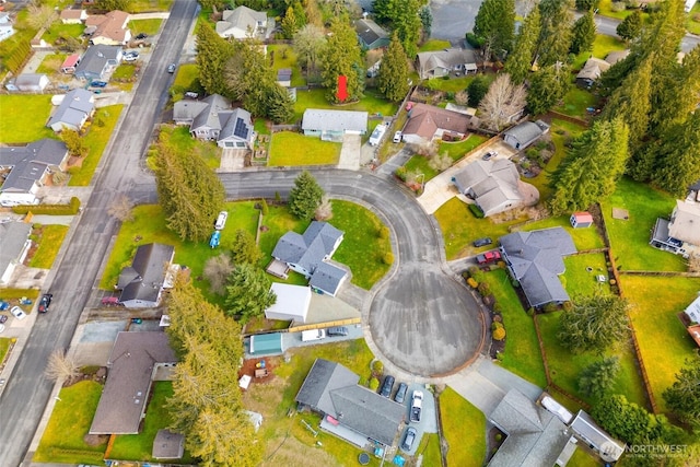 birds eye view of property with a residential view