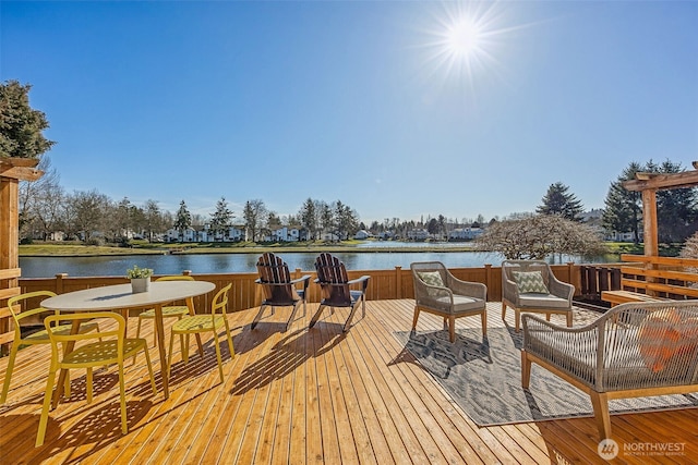 deck featuring a water view