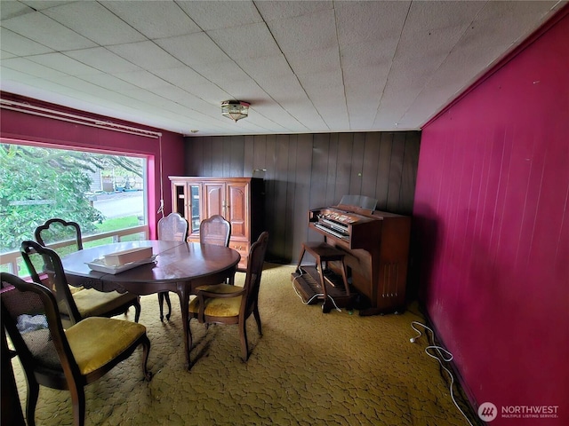 view of carpeted dining area