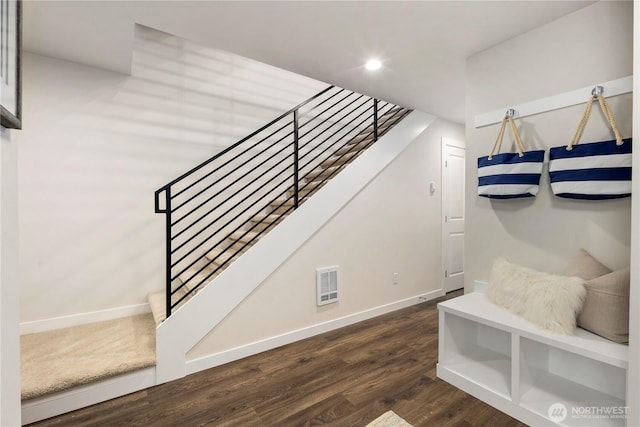 staircase with recessed lighting, wood finished floors, visible vents, and baseboards