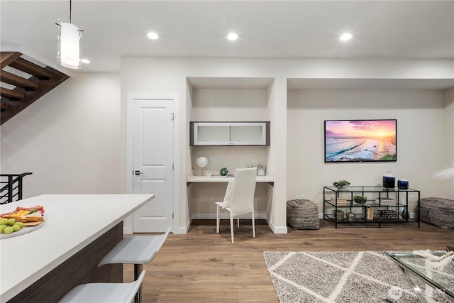 interior space with recessed lighting, light wood-style flooring, baseboards, and stairs