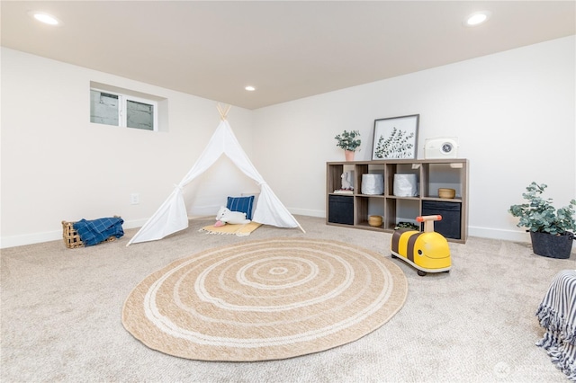 recreation room featuring recessed lighting, baseboards, and carpet floors