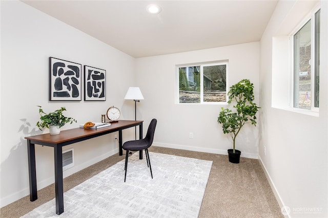 office featuring visible vents, recessed lighting, baseboards, and carpet