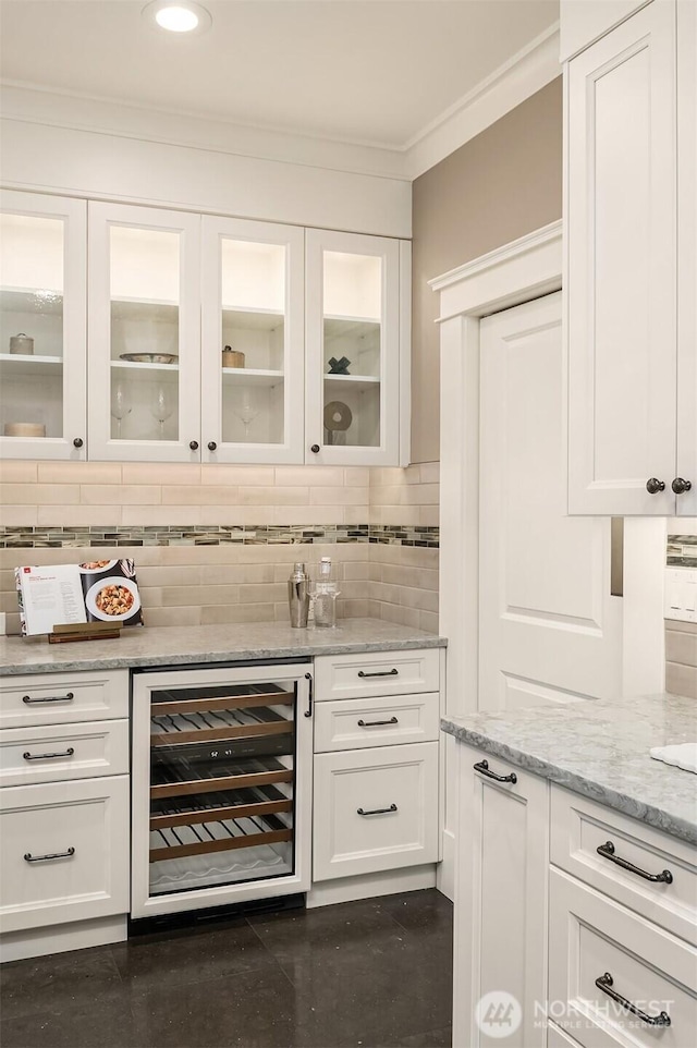 2311 42nd Ave E, Seattle, WA 98112 - bar featuring decorative backsplash, recessed lighting, beverage cooler, and ornamental molding