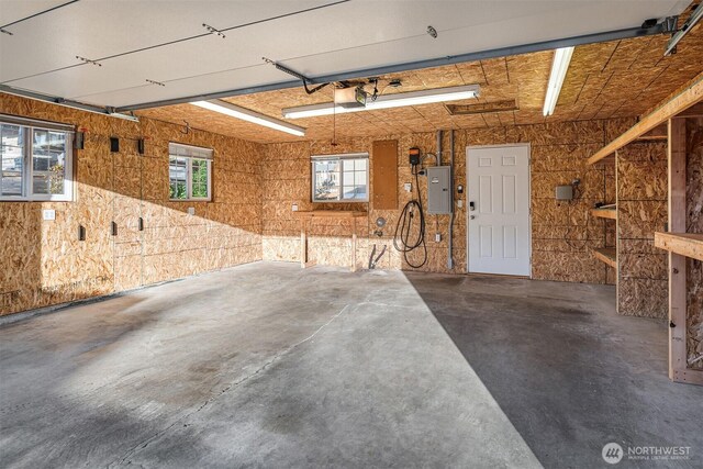 2311 42nd Ave E, Seattle, WA 98112 - garage with electric panel and a garage door opener
