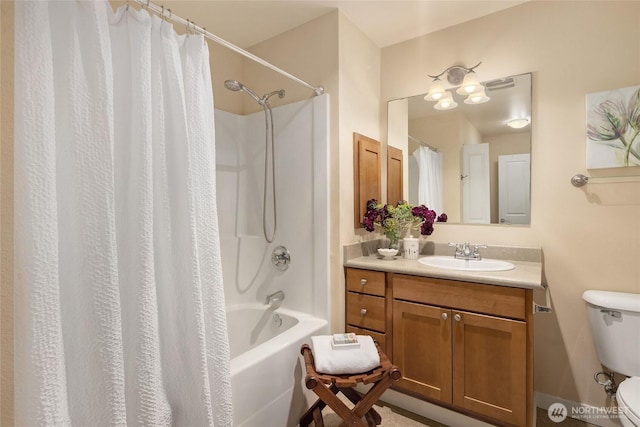 full bathroom featuring shower / bath combination with curtain, visible vents, vanity, and toilet