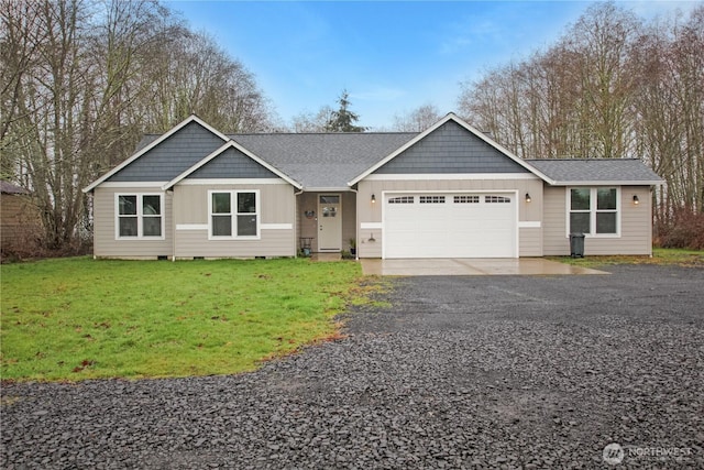 ranch-style home with aphalt driveway, an attached garage, a shingled roof, board and batten siding, and a front yard