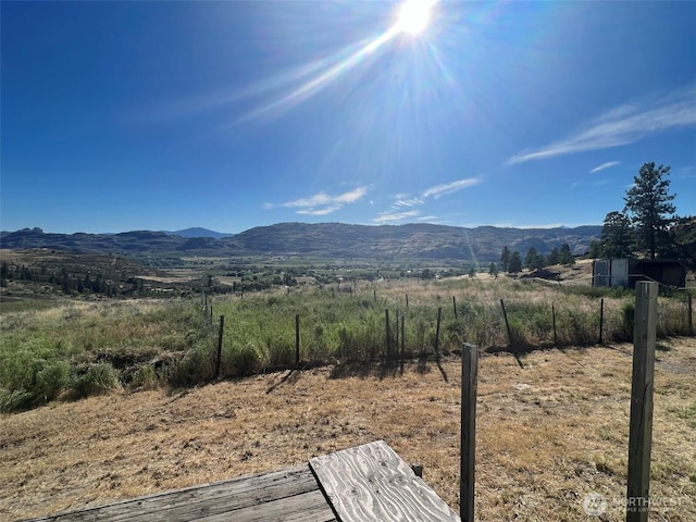 view of mountain feature featuring a rural view