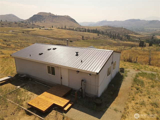 drone / aerial view with a rural view and a mountain view