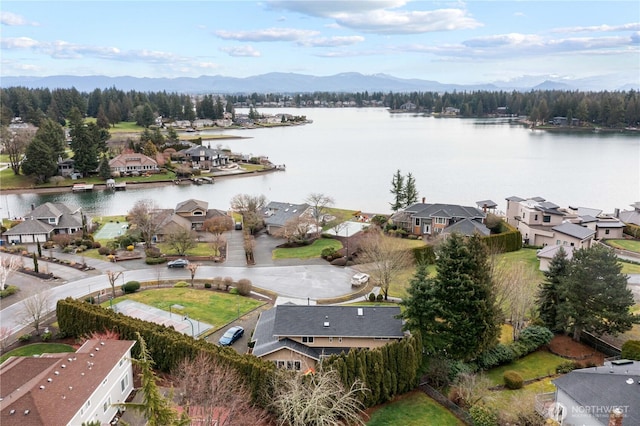 aerial view featuring a residential view and a water and mountain view