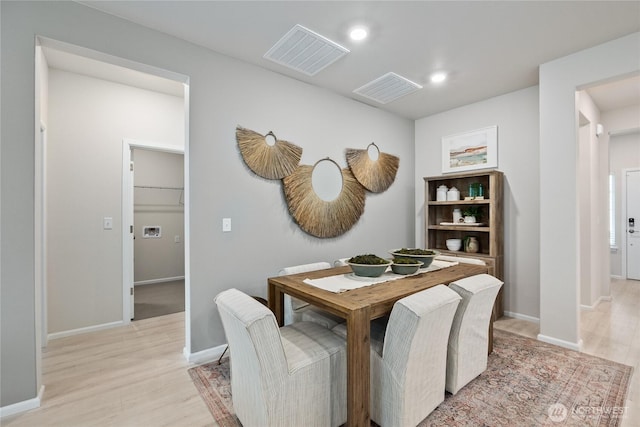 dining area with recessed lighting, light wood-type flooring, visible vents, and baseboards