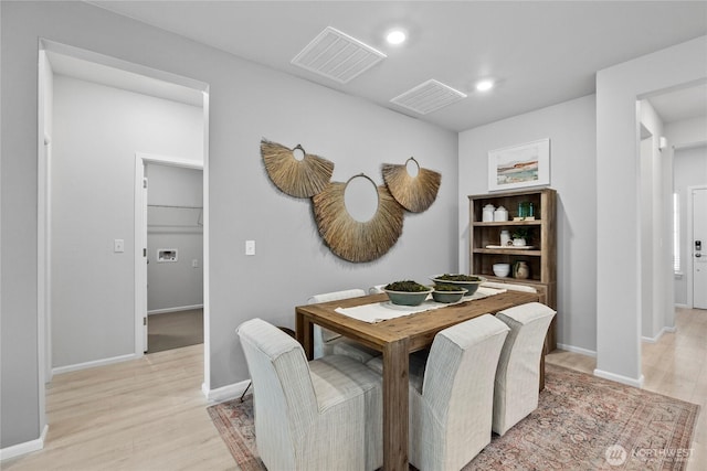 dining space featuring recessed lighting, light wood-type flooring, visible vents, and baseboards