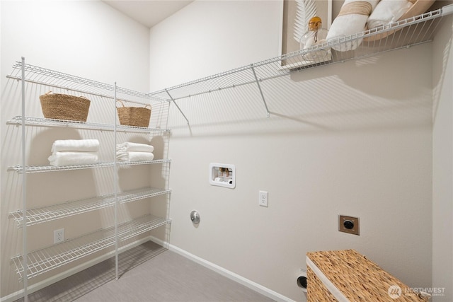 laundry area with laundry area, baseboards, washer hookup, and hookup for an electric dryer