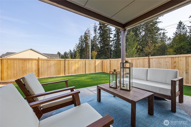 view of patio with a fenced backyard and outdoor lounge area