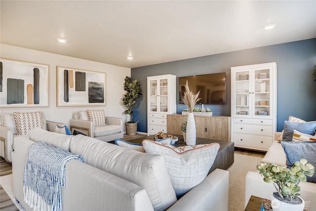 living area featuring recessed lighting and wood finished floors