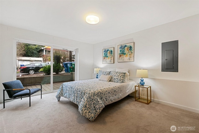 carpeted bedroom featuring access to exterior, electric panel, and baseboards