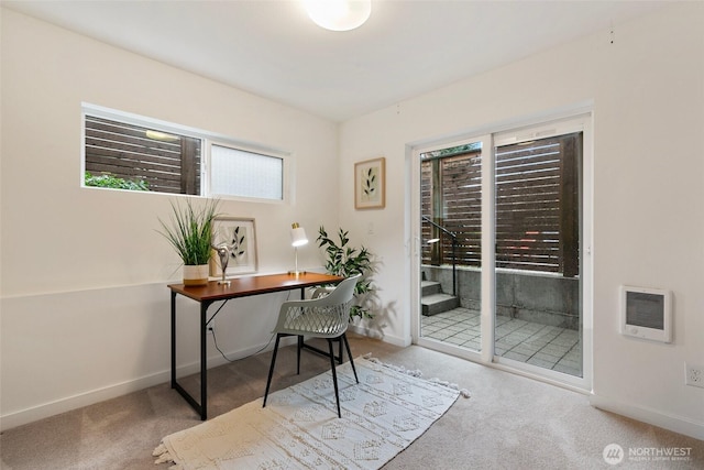 home office with baseboards, carpet, and heating unit