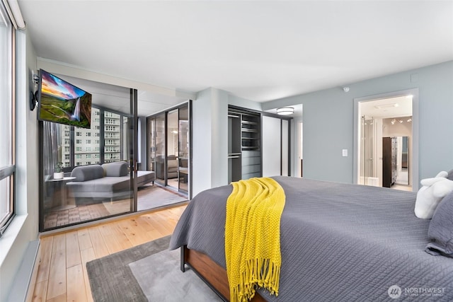 bedroom featuring wood finished floors