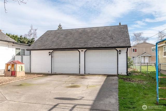 detached garage with fence