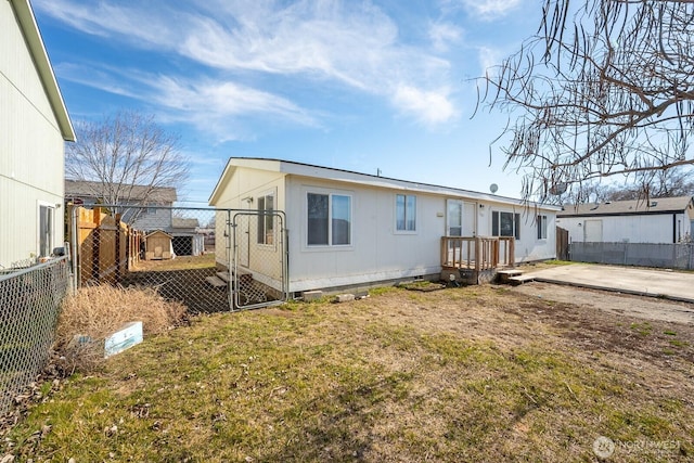 rear view of property with fence private yard, a patio, and a yard