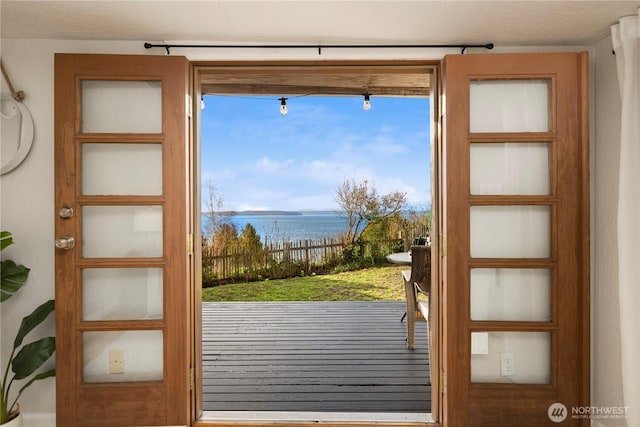 entryway featuring a water view