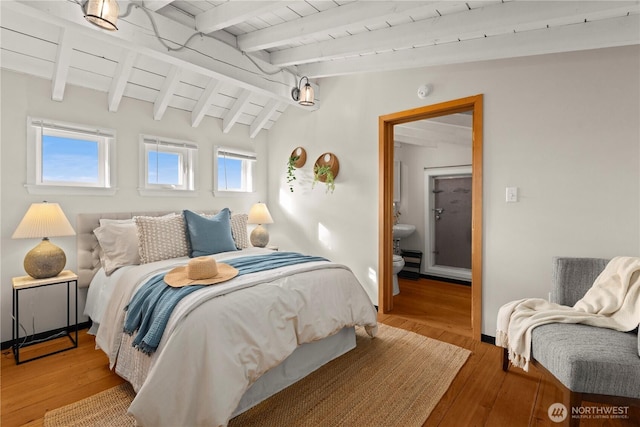 bedroom featuring wooden ceiling, vaulted ceiling with beams, light wood-style flooring, and baseboards