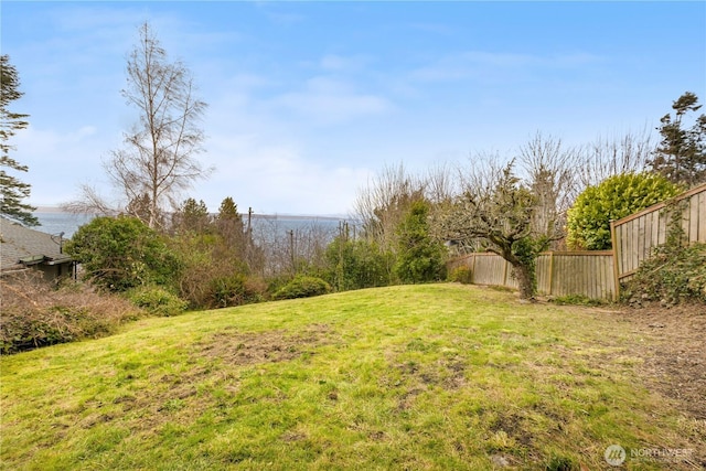 view of yard featuring fence