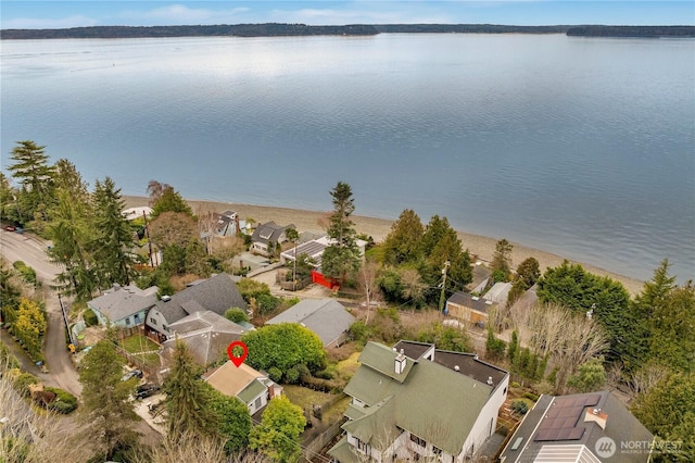 birds eye view of property featuring a water view and a residential view