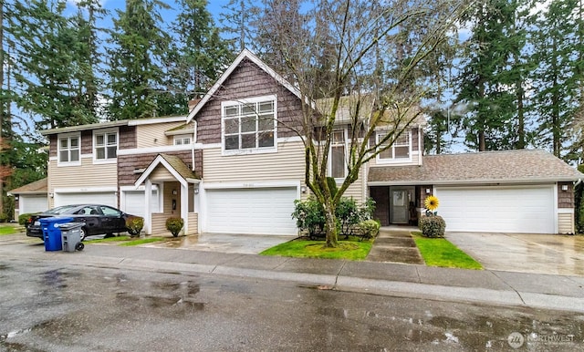 view of front of house with a garage and driveway