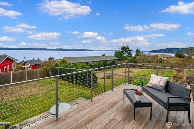 deck featuring a water view