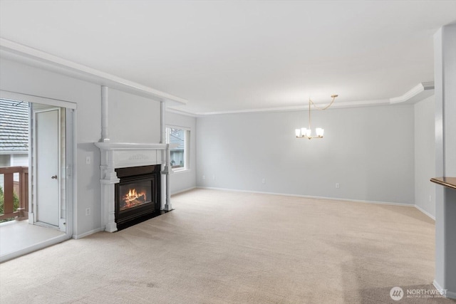 unfurnished living room with a fireplace with flush hearth, baseboards, an inviting chandelier, and carpet floors