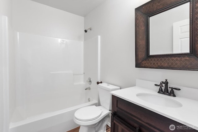 full bath featuring vanity, toilet, and shower / bathing tub combination