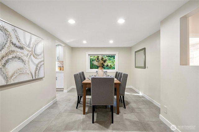 dining area with recessed lighting and baseboards