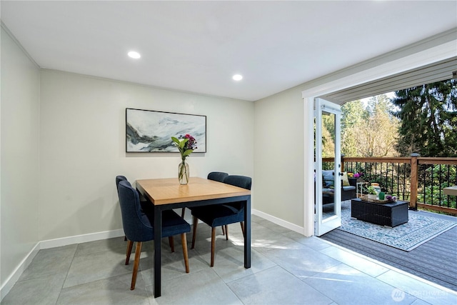 dining area featuring light tile patterned flooring, baseboards, and recessed lighting