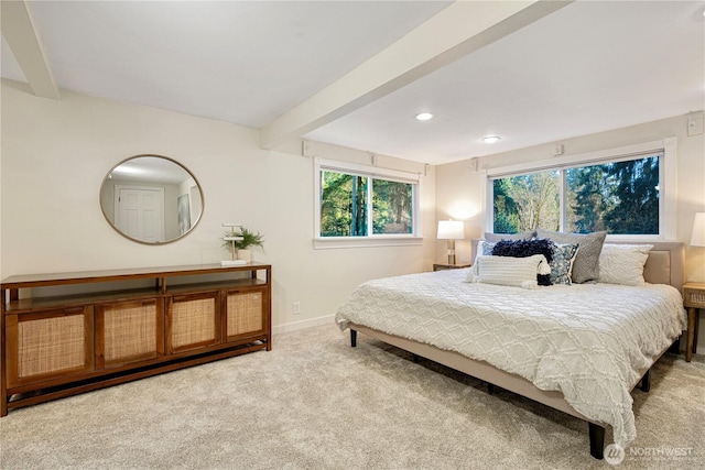 carpeted bedroom featuring recessed lighting, beamed ceiling, and baseboards