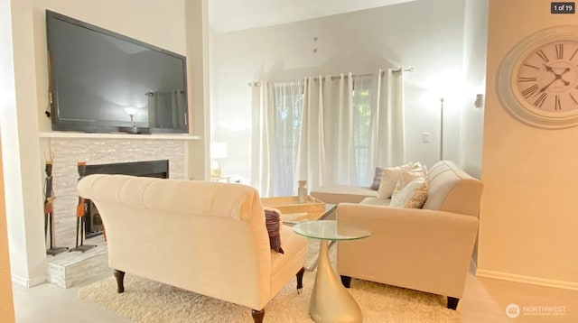 sitting room featuring a fireplace