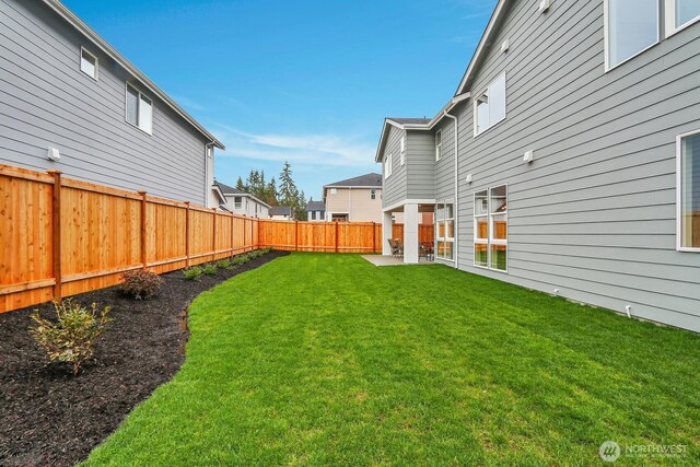 view of yard featuring a fenced backyard and a patio