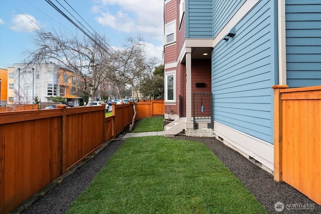 view of yard featuring fence