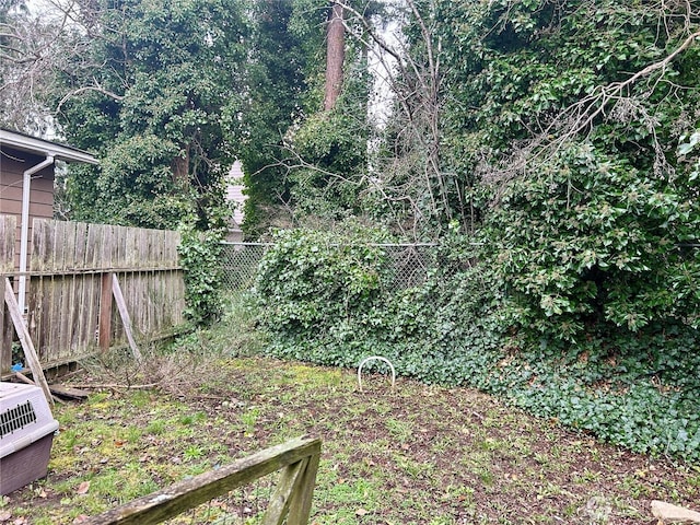 view of yard with fence