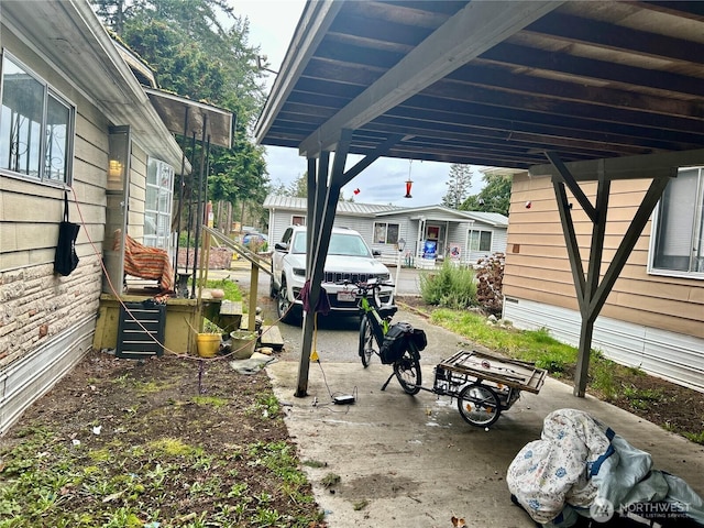 view of patio / terrace with a carport