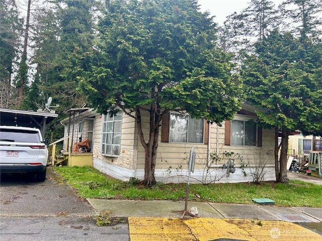 view of front of house with stone siding