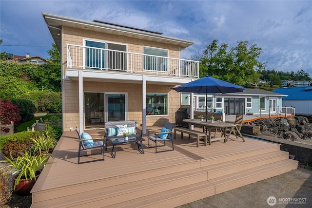 deck with an outdoor hangout area