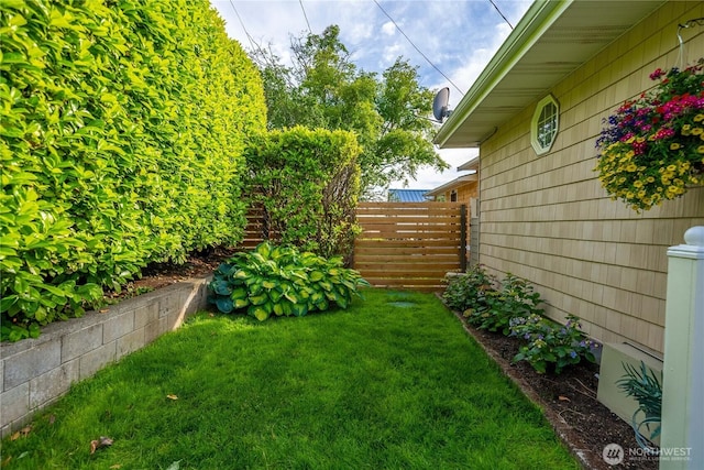 view of yard featuring fence