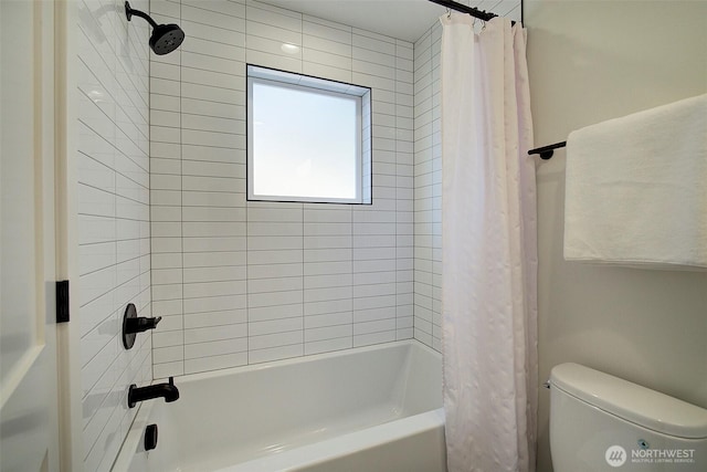 bathroom with toilet and shower / bathtub combination with curtain