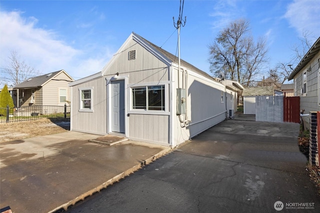 exterior space featuring fence and a patio