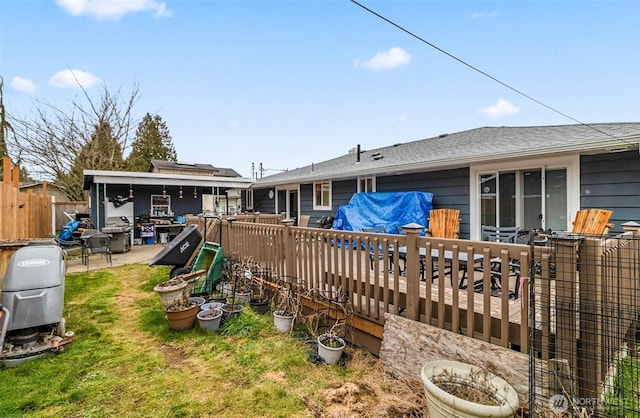 back of property with fence